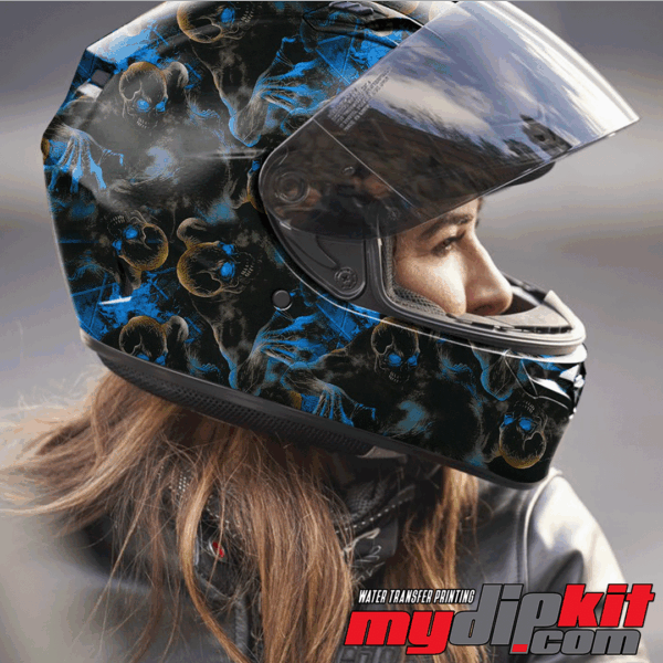 Blonde woman wearing a motorcycle helmet covered in Blue Creeper Skulls pattern through hydro dip.