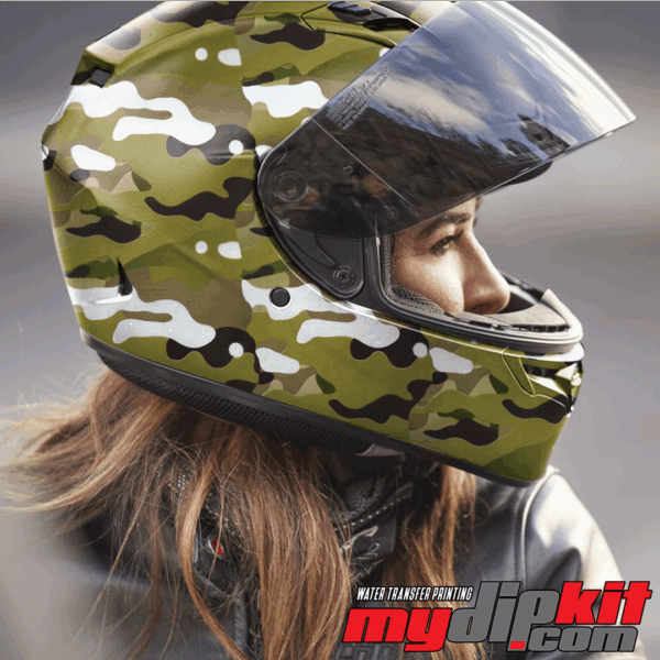 Blonde woman wearing a motorcycle helmet covered in "multi cam" green military camo through hydro dip.