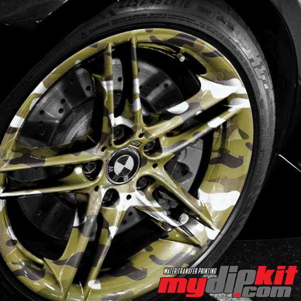 BMW Wheel covered in "multi cam" green military camo through hydro dip