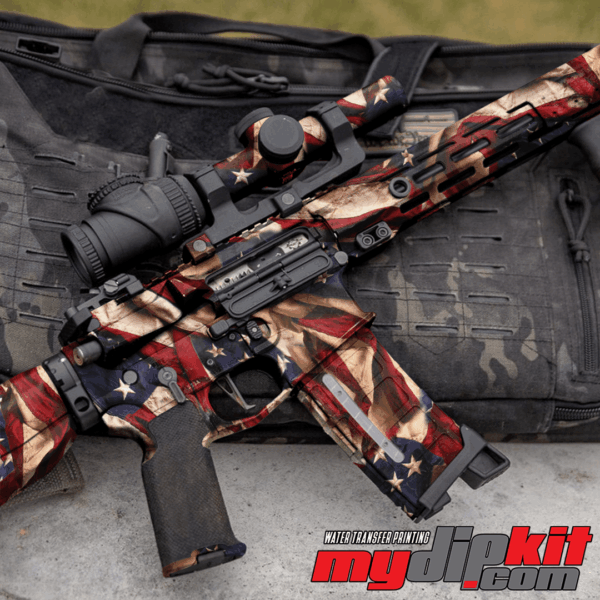 Firearm covered in American Flag pattern through hydro dip.