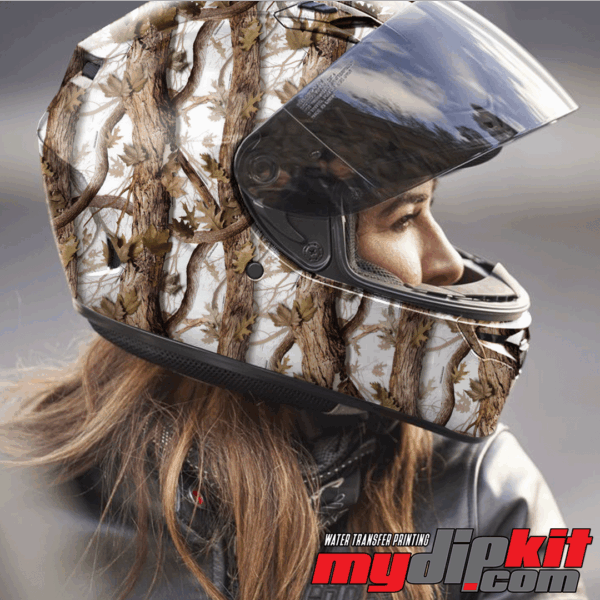Blonde woman wearing a motorcycle helmet covered in Hunting Attractions Snowblind snowy hunting camo through hydro dip.